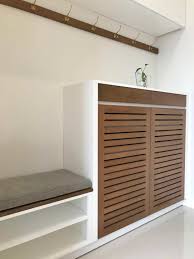 Entryway custom shoe cabinet carpentry