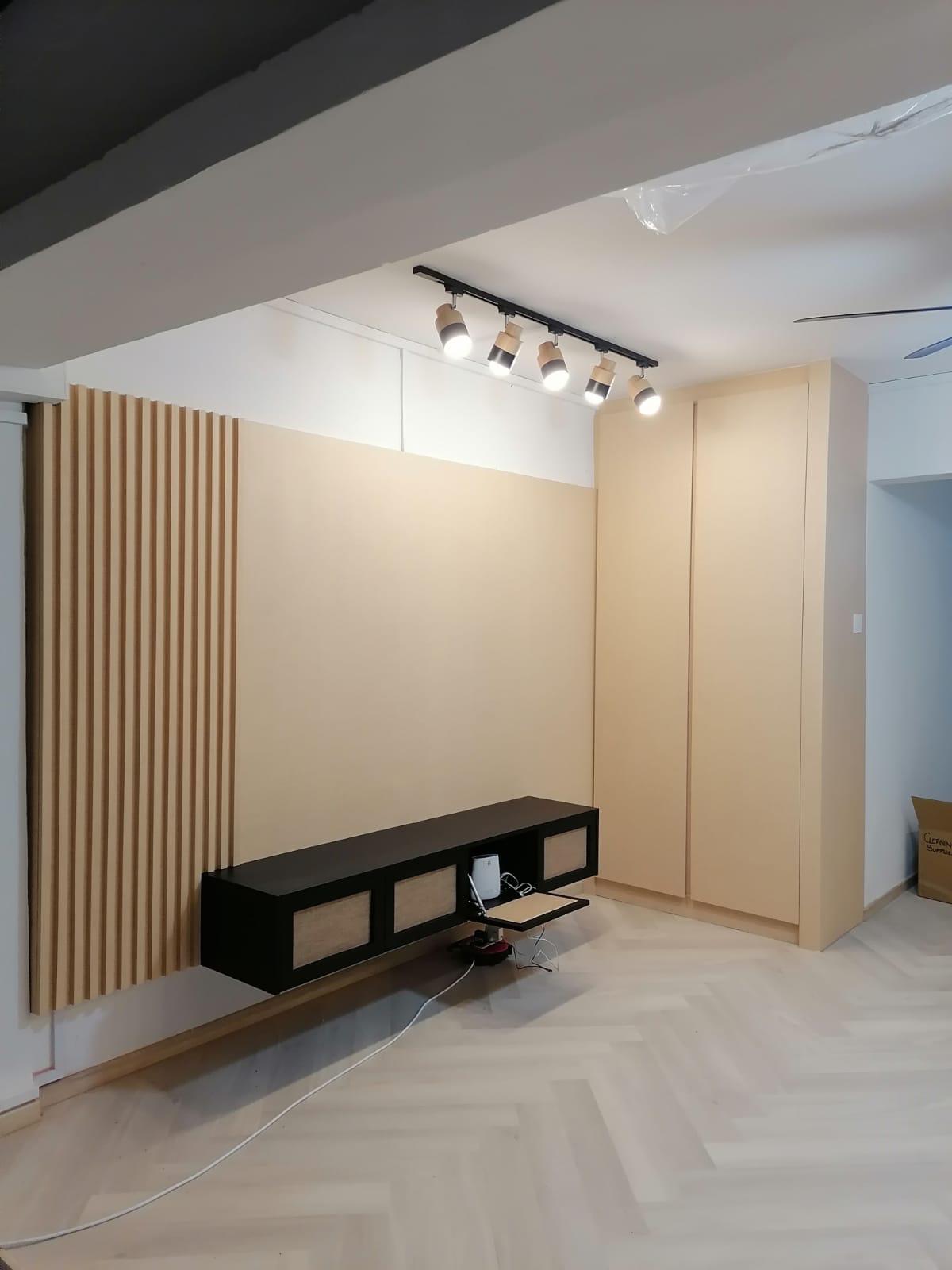 Custom wall-mounted TV console carpentry